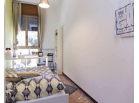Promo: Stanza in Viale Giovanni Vicini - Apartments