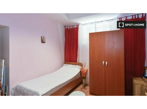 Quarto para alugar em residência em Portuense, Roma - Aluguel