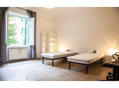 Shared Room in Largo Magnagrecia - Apartments
