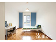 Stylish Co-Living: Spacious Room in Vibrant Neighborhood… - Stanze