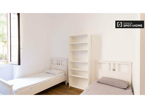 Cama para alugar em apartamento de 9 quartos em Città Stud - Aluguel