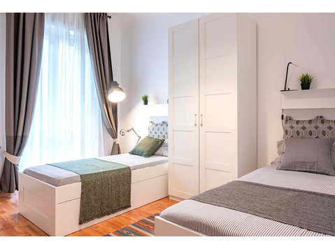 Stanza in via biella 22  shared room d2 - bed a - Wohnungen