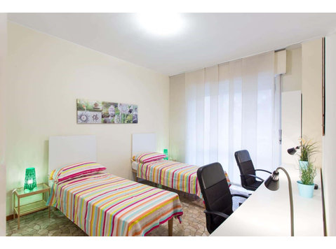 Stanza in via carnia 29  shared room d1 - bed a - Appartementen