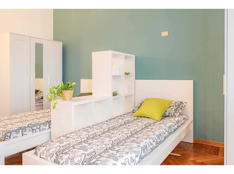 Stanza in viale romolo 1  shared room d2 - bed b - Pisos