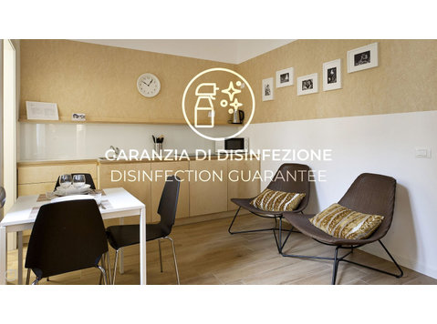 Via Aminto Caretto, Milan - Apartments