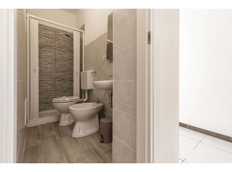 Via Michele Coppino SNC - Stanza 46 - Apartments