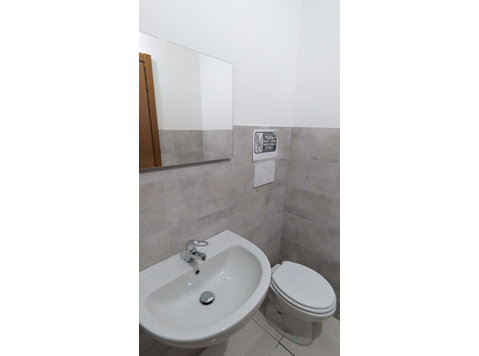 Via Michele Coppino SNC - interno piazza 26 - Stanza 56 - Apartments