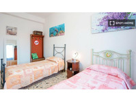 Chambre à louer dans un appartement de 4 chambres à Cagliari - À louer
