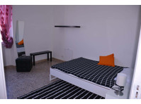 Via Ingurtosu n9 - Stanza 2 - Appartamenti
