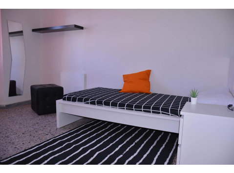 Via Ingurtosu n9 - Stanza 8 - Apartments