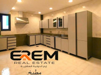 For rent in Al Rawda Contains 4 master Bedrooms - Apartmani