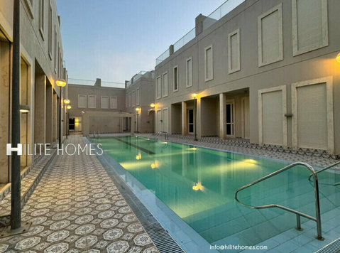 Four bedroom Complex Villa for rent in Abu Al Hasaniya - Apartemen