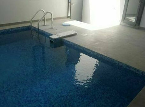 New villa with garden swimming pool for rent in Surra - Apartman Daireleri