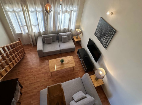 Lovely Furnished One-bedroom Apartment w/ Large Balcony - Căn hộ