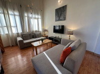 Lovely Furnished One-bedroom Apartment w/ Large Balcony - شقق
