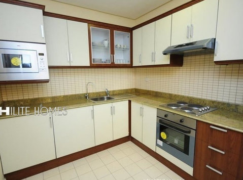 Sharq - Modern Fully furnished two bedroom apartment - Căn hộ