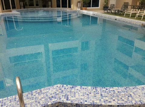 The Bridge Co. – Luxury 2-Bedroom Fully Furnished Apartments - Apartments