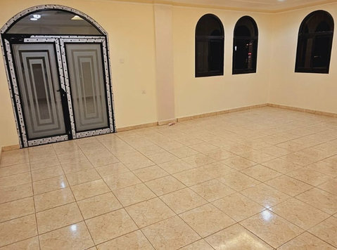 amazing ground villa flat with yard in salwa - Apartments