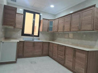 A floor for rent in Abu Fatira consisting of a large hall, - Houses