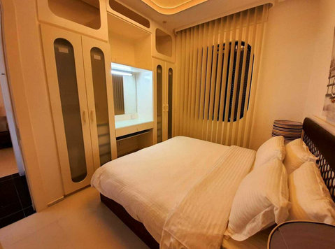 Lovely and Modern 2-bedroom Apartment - Casas