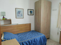 double bedroom at St Paul Bay (6a) - Комнаты