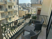 Enjoy Spacious Modern Living in This 3-bedroom Apartment