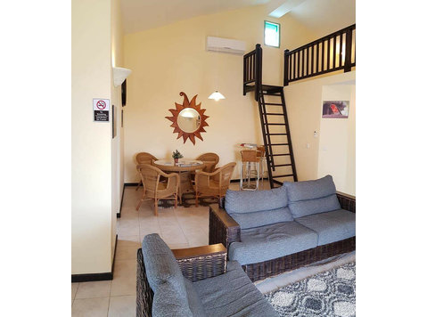 Luxury 4-bedroom villa near beach Trou D'Eau Douce - เพื่อให้เช่า