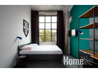 Moderne deluxe kamer met queensize bed - Appartementen