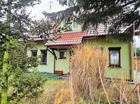 Cosy house with a garden on a large plot Szczepankowo Street - Apartments
