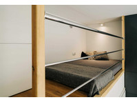 Modern studio apartment with bed - อพาร์ตเม้นท์