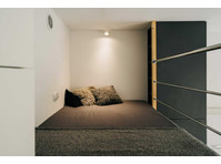 Modern studio apartment with bed - Apartemen