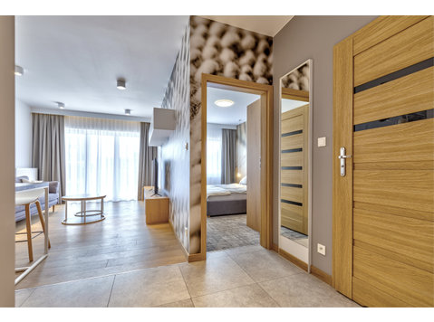 New, modern 2 rooms apartment in Central Park Lodz - Apartments