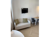 Studio apartment in the heart of Lodz - Квартиры