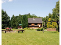 Całoroczny domek nad jeziorem- W Ińskich Parkach Krajobrazow - Locations de vacances