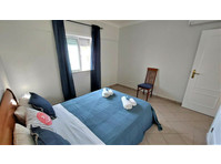 Flatio - all utilities included - Close to beach, the strip… - Te Huur