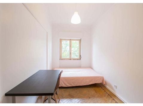 Quarto com cama de casal em apartamento com 3 quartos -… - Wohnungen