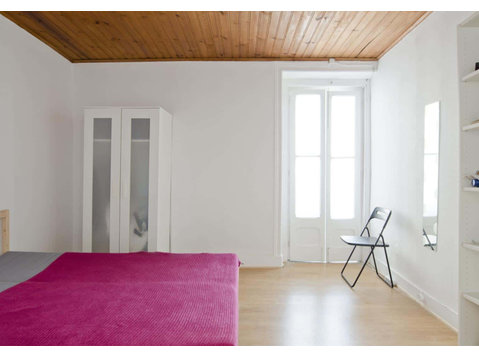 Quarto com cama de casal em apartamento com 4 quartos -… - Apartman Daireleri