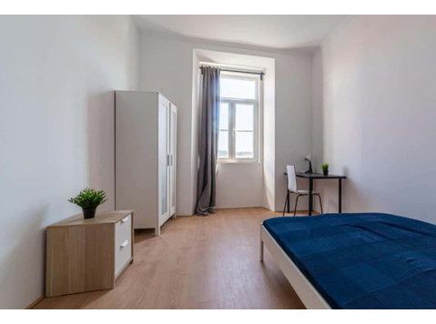 Quarto com cama de casal em apartamento com 9 quartos -… - 公寓