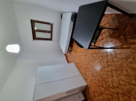 Cozy room with double bed + single bed near Agualva station… - 	
Lägenheter