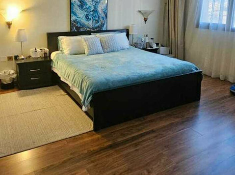 Ensuite bedroom în West Bay Lagoon - Flatshare