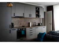 Flatio - all utilities included - New, modern & cosy apt.… - Aluguel