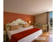 Habitación de hotel en Sevilla con impresionantes vistas al… - Pisos
