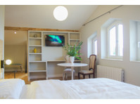 Flatio - all utilities included - 35 sqm suite in a villa… - WGs/Zimmer