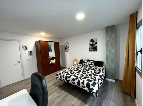 Flatio - all utilities included - Private Room in CoLiving… - Stanze