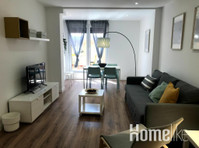 Modern and bright apartment - 	
Lägenheter