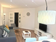 Modern and bright apartment - 	
Lägenheter