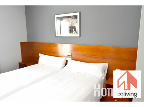 Moderna habitación de hotel en Soria - Pisos