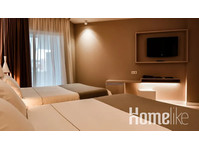 Modern hotel room in Calella - Комнаты