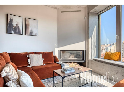 Modern 1BR gemeubileerd appartement met balkon - Appartementen