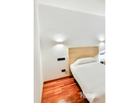 Habitación con baño privado en residencia universitaria en… - Pisos compartidos